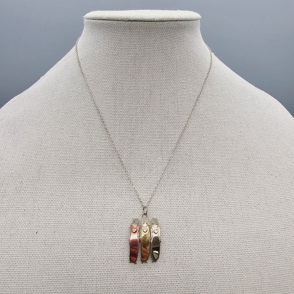 Elegant Gold and Silver Pendant Necklace